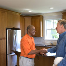 Home owner talking with contractor